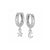 The Land of Salt Star and Moon Huggie Hoops in Silver