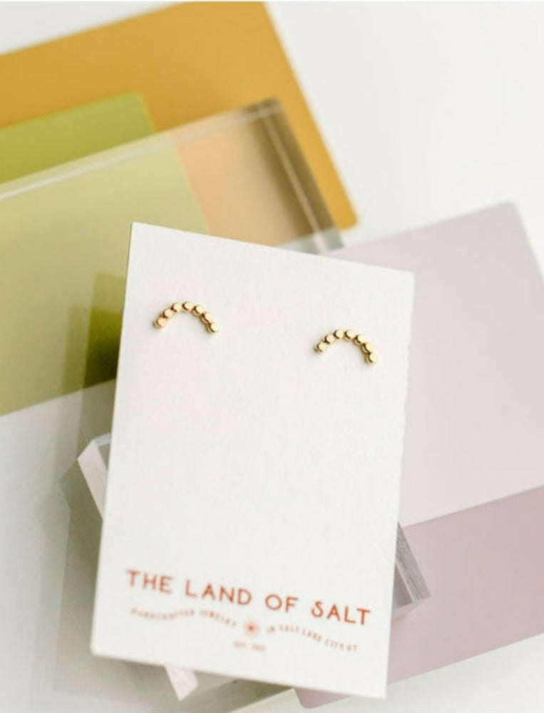The Land of Salt Hammered Dot Arch Stud Earrings